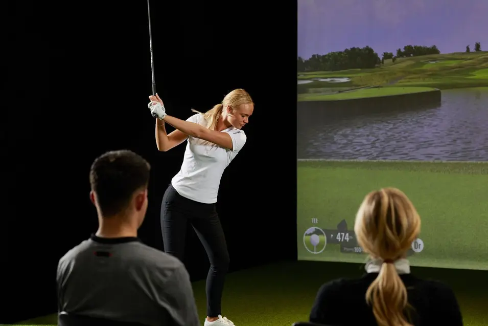 Playing in a Golf Simulator